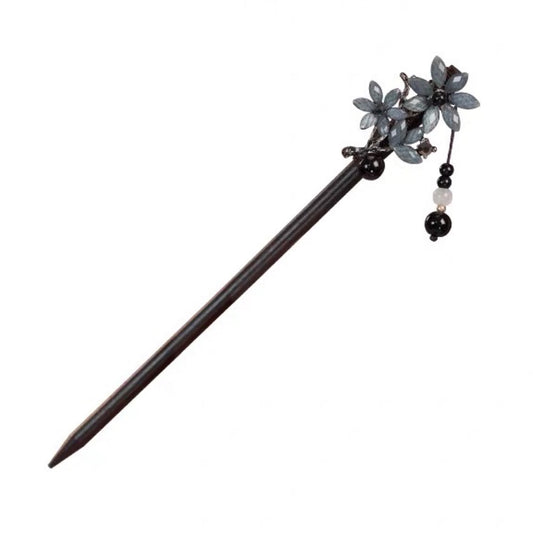 Elegant hårnål med grå blomster