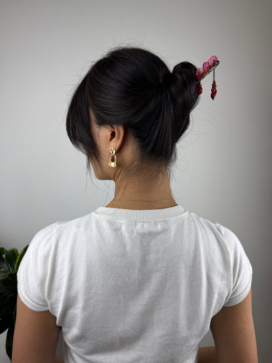 Hårnål i træ med røde kronblade | MAS SELECTION