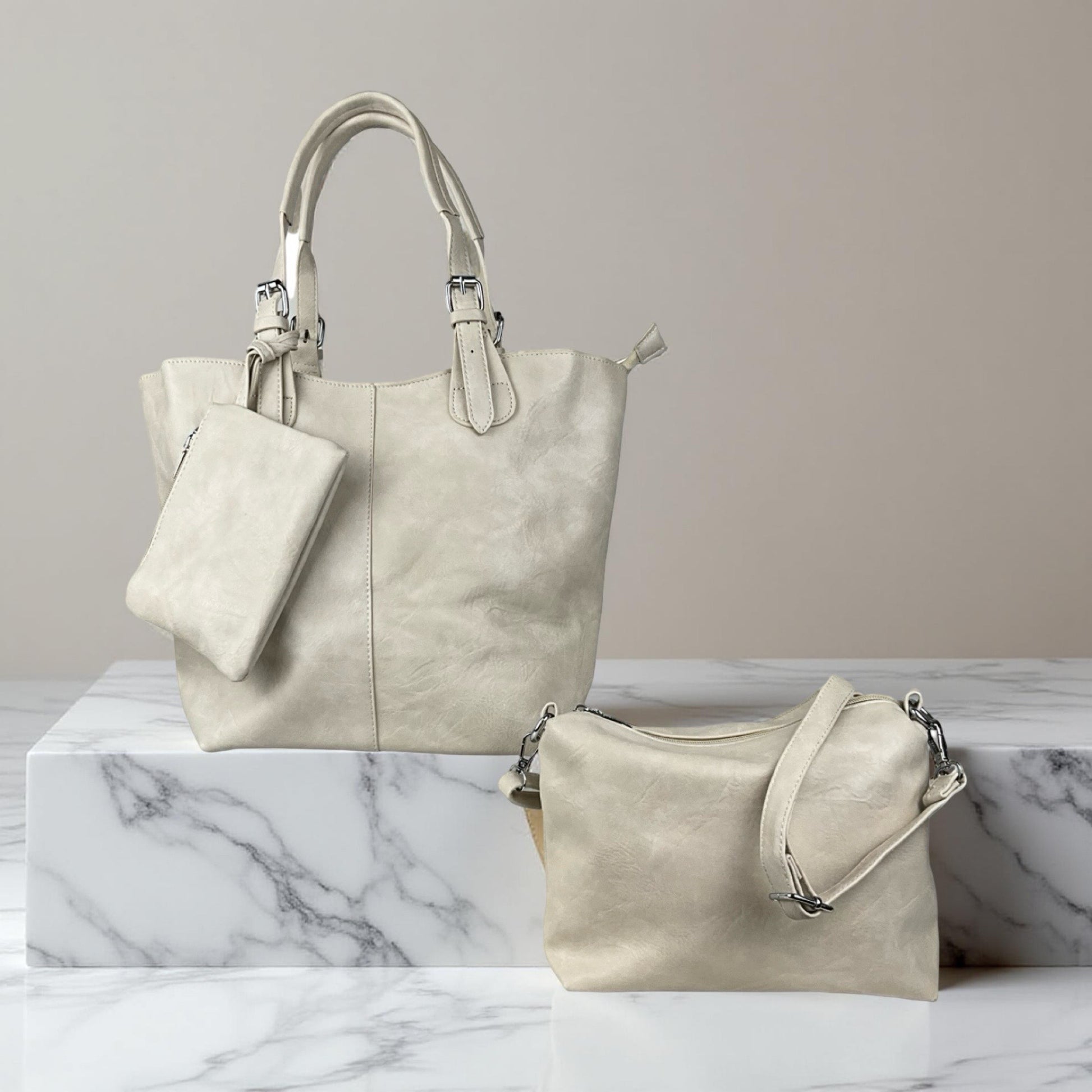 Alle tre dele af Elisa 3-i-1 dametaske i beige vist samlet – shopper, skuldertaske og clutch
