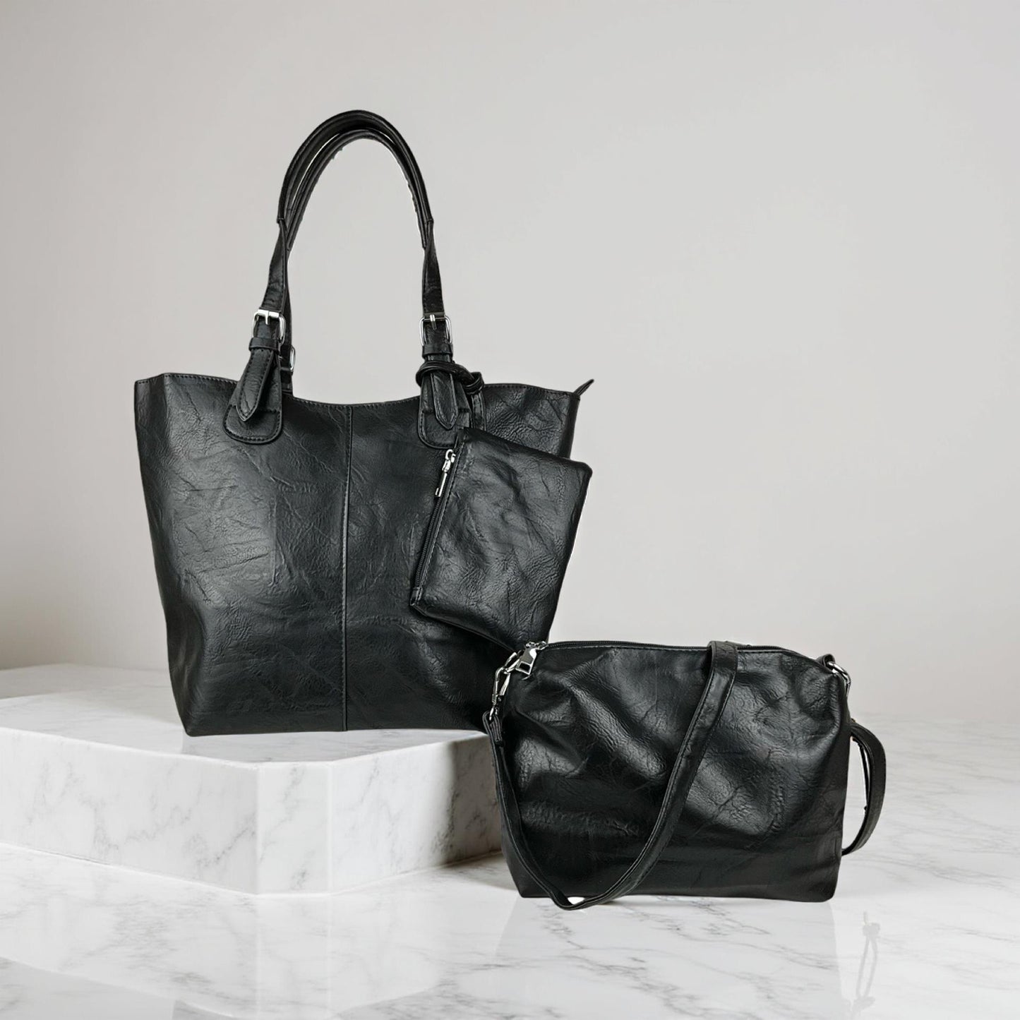Alle tre dele af Elisa 3 i 1 dametaske i sort vist samlet – shopper, skuldertaske og clutch