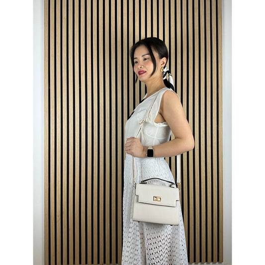 Vittoria Crossbody-minitaske Creme