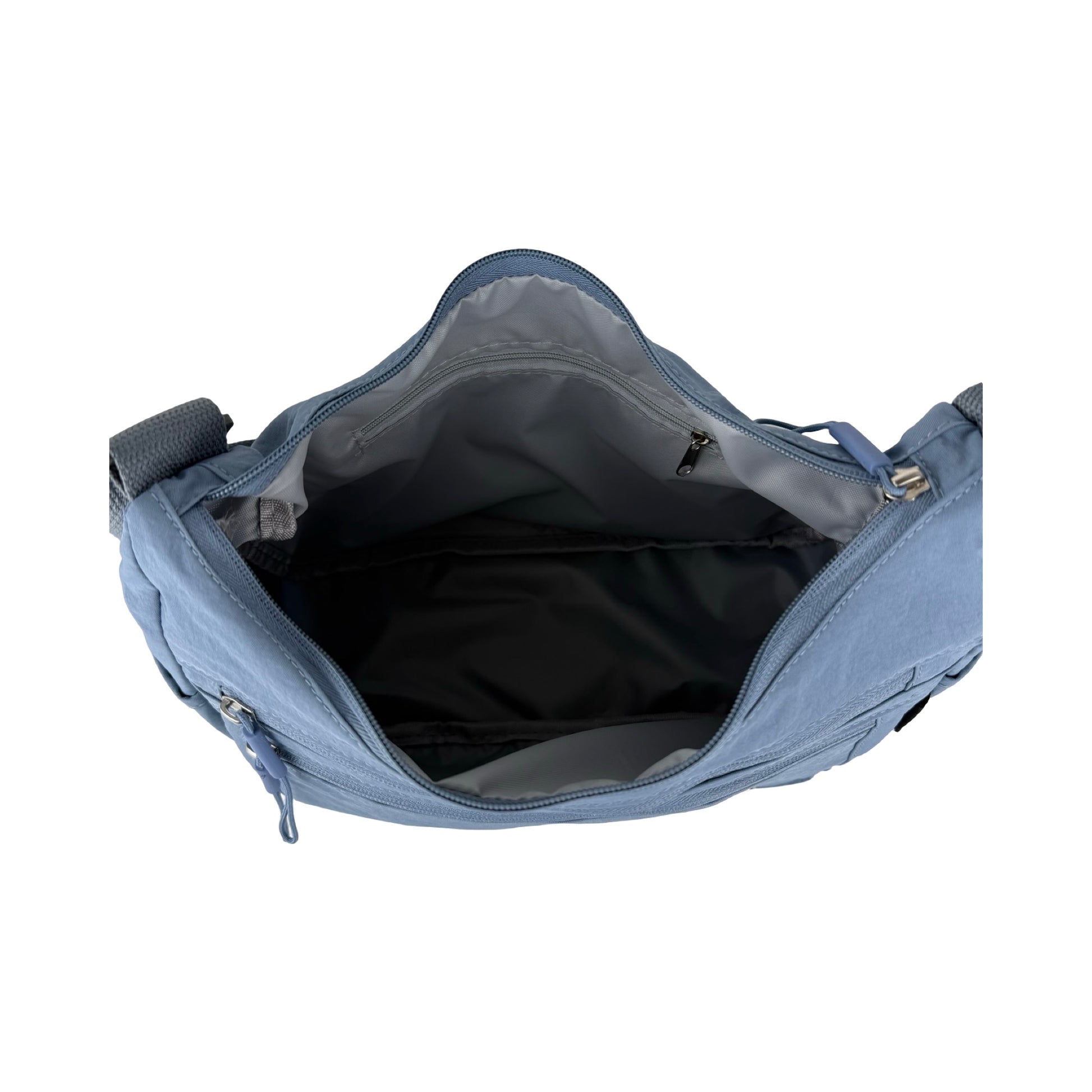 Indvendigt billede af Asta skuldertaske i lyseblå med åben lynlås viser rummeligt indhold