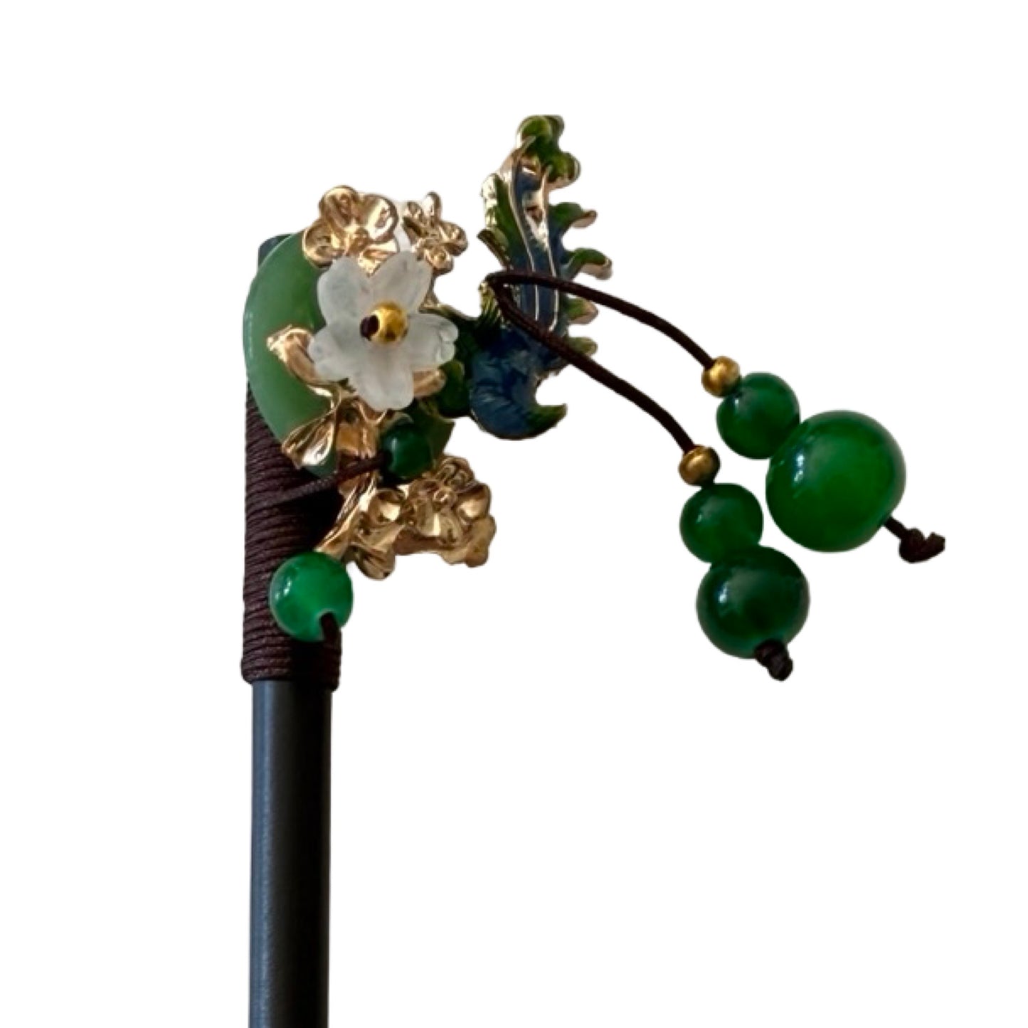 Elegant hårnål med grønne perler og blomsterdetaljer